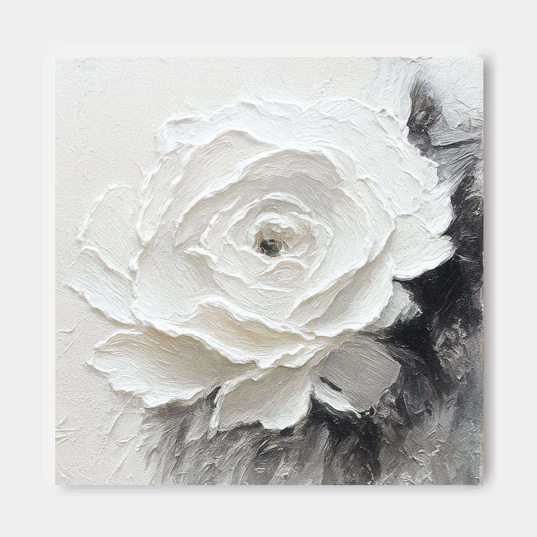 The image is a close-up of a white flower with a black center, set against a white background.