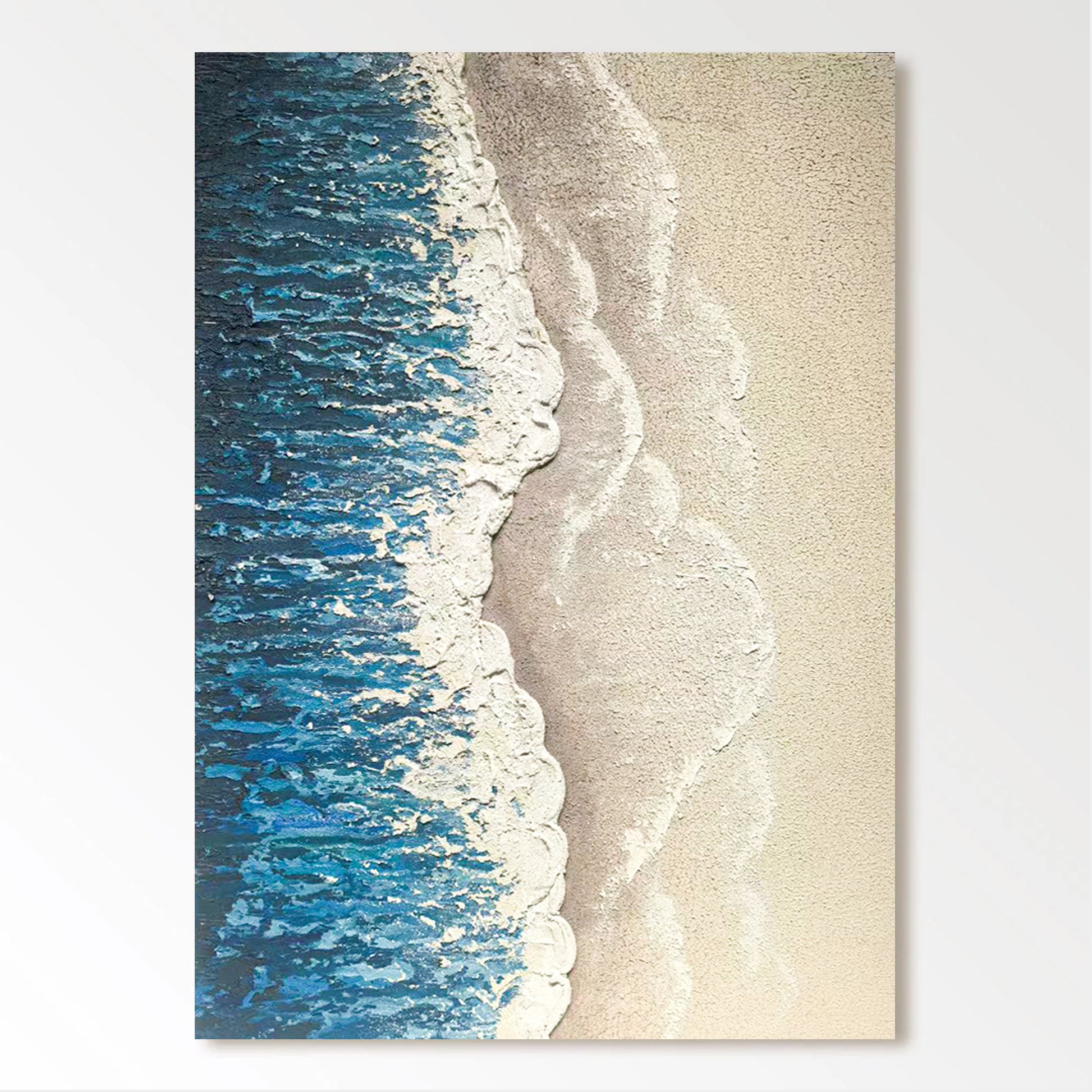 a serene beach scene with a wave gently lapping against the sandy shore.