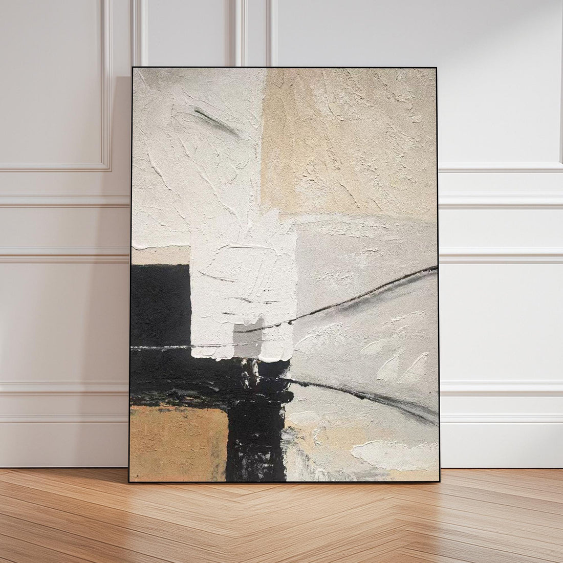 The image is an abstract painting featuring a combination of white, black, and beige colors. The painting has a textured and layered appearance, with brushstrokes and splatters creating a sense of depth and movement.