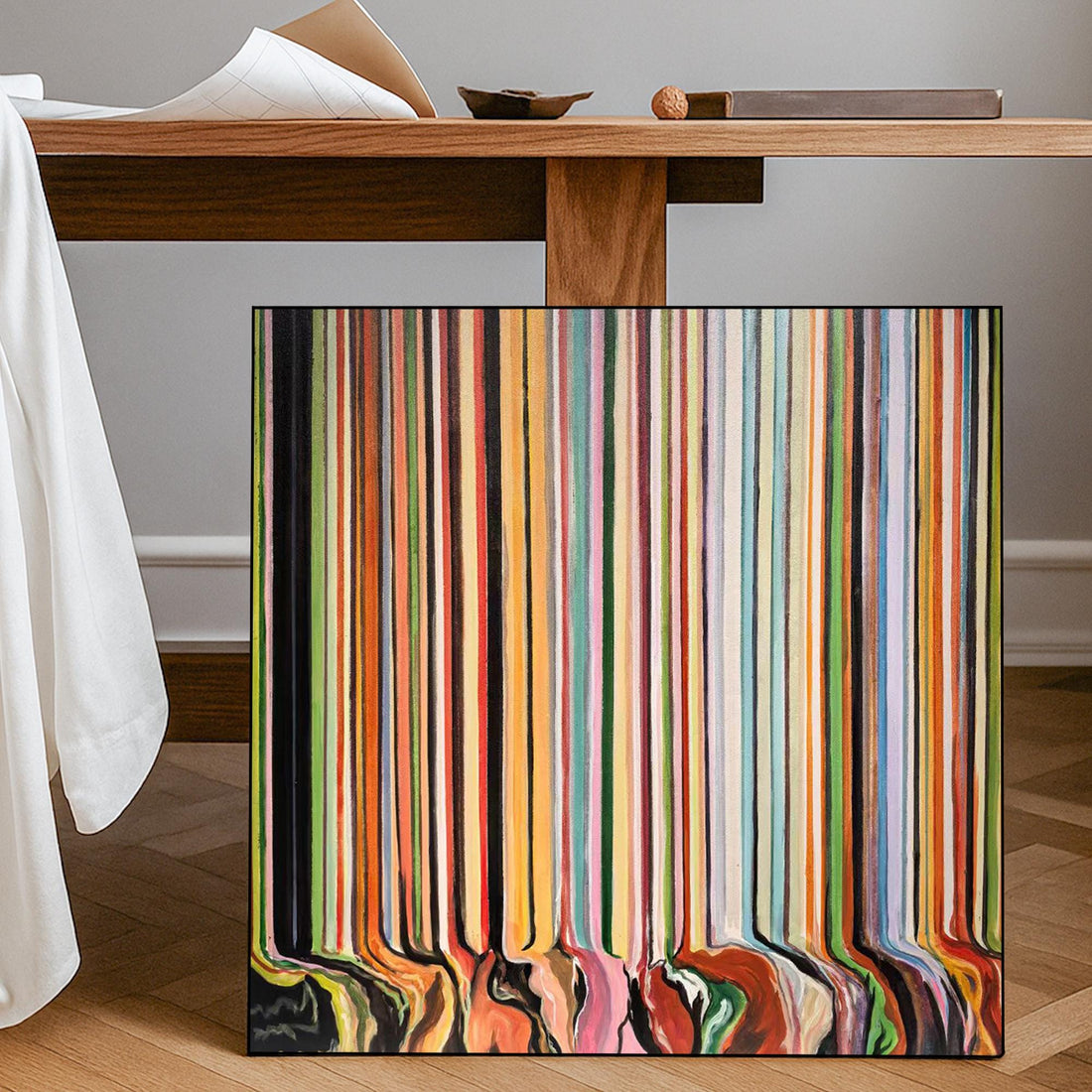 The image is an abstract painting with a vibrant and colorful composition of vertical lines in various colors, including red, orange, yellow, green, blue, and purple.