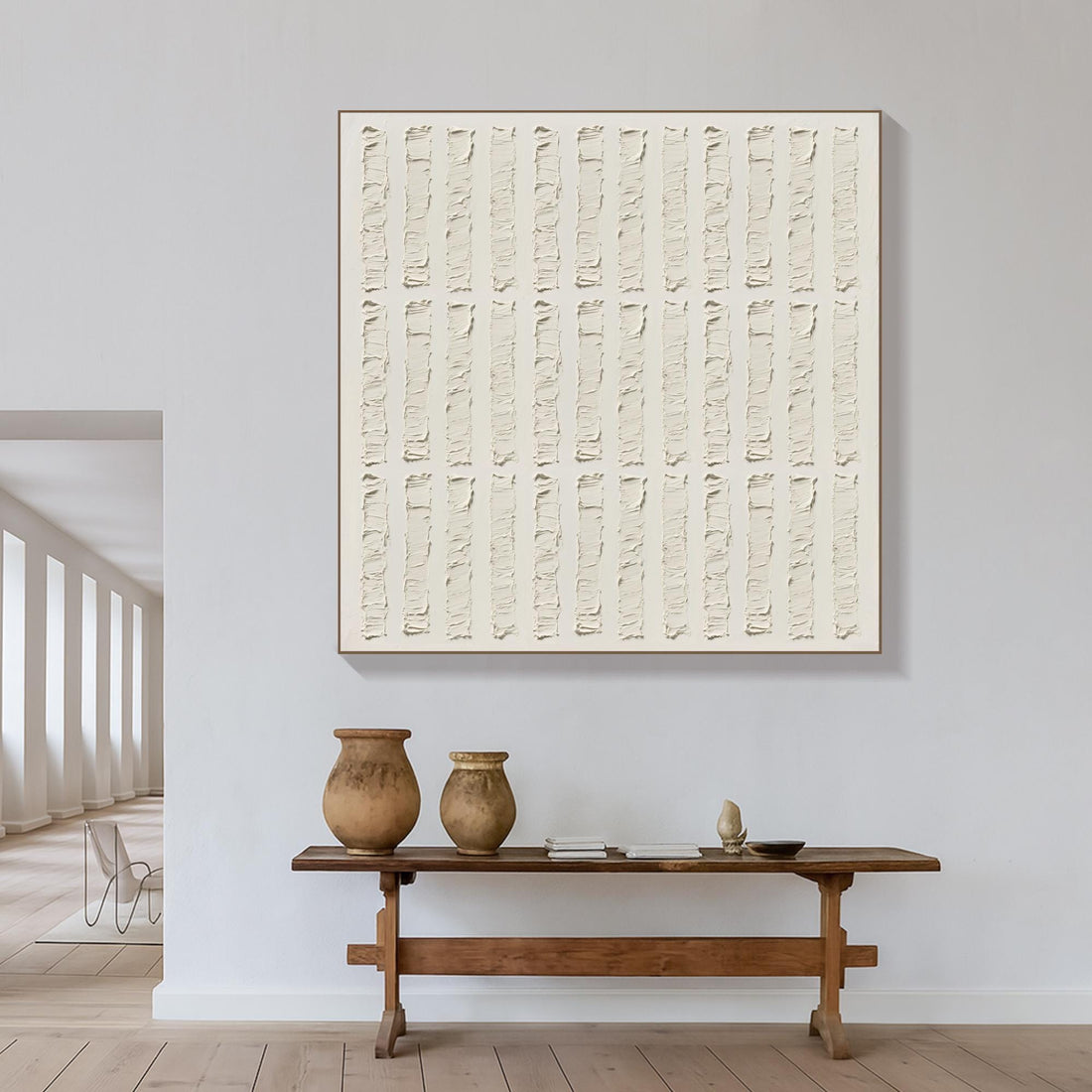 The image is a simple, minimalist artwork consisting of a repeating pattern of vertical lines on a white background.