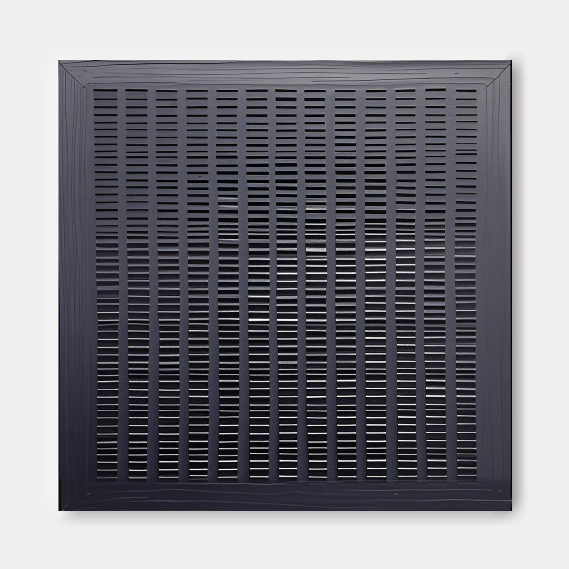The image is a square-shaped object with a grid-like pattern of vertical lines, creating a visually striking and abstract design.