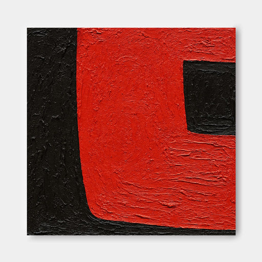 The image is a square painting with a bold, abstract design. The dominant colors are red and black, with the red being more prominent and filling a large portion of the canvas. The black, on the other hand, is used to create a contrast and accentuate the red. The painting does not contain any discernible objects or actions, and the overall composition is simple and minimalist.