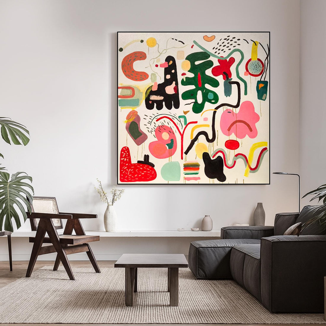 The image is a vibrant and abstract painting featuring a variety of shapes, colors, and textures. The artwork is a lively and dynamic composition, with a mix of organic and geometric forms. The use of bold colors, such as red, green, yellow, and black, adds to the overall visual impact of the piece. The painting is a lively and energetic representation of abstract art, showcasing the artist's skill and creativity in their work.