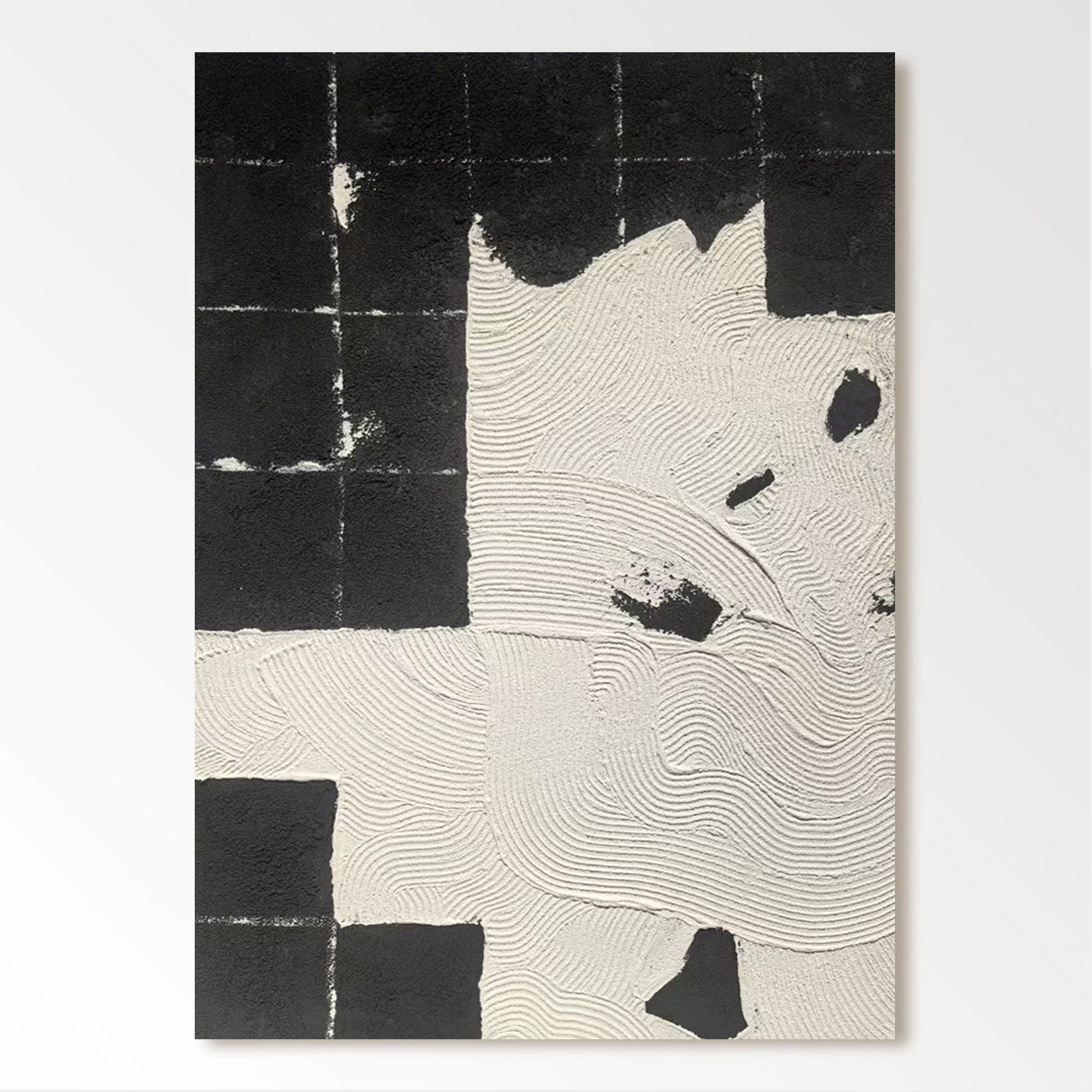 The image is a black and white abstract artwork featuring a grid-like pattern of squares and rectangles, with some areas of white and black paint or texture.