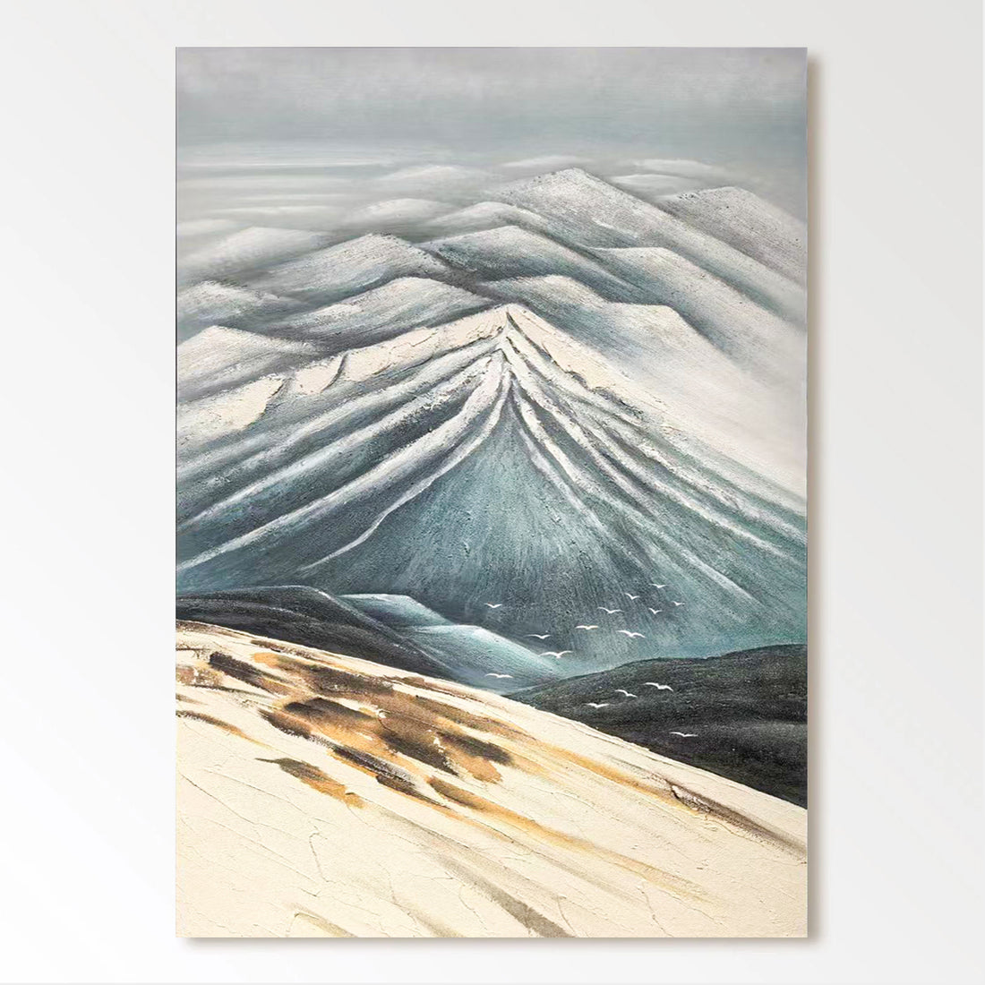 a majestic mountain range with snow-capped peaks and a hazy, blue sky in the background.