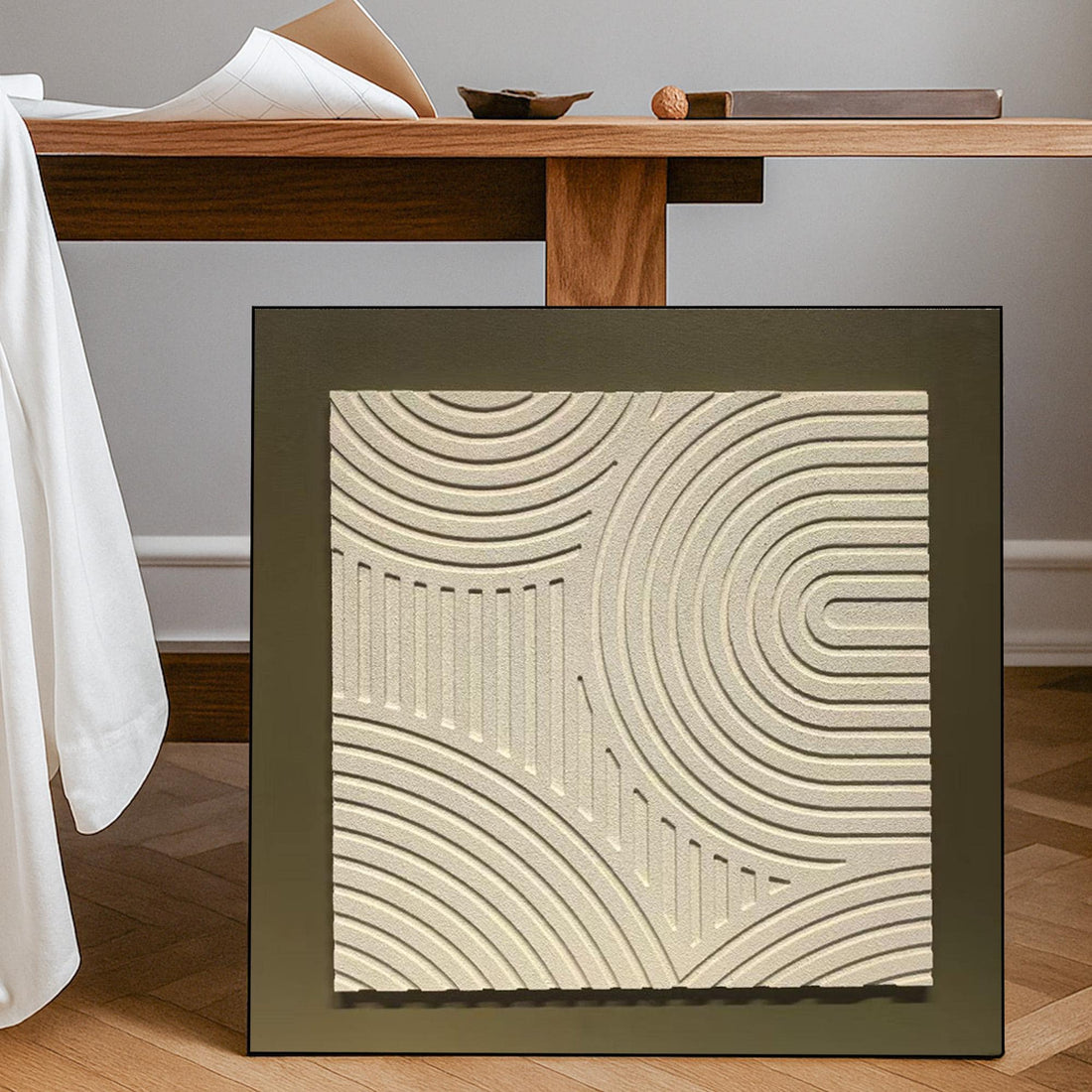 a square-shaped, abstract design with a repeating pattern of curved lines and lines, creating a sense of rhythm and movement.
